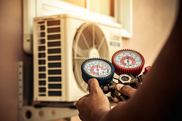 Professional Air Conditioning Service technician working in Phoenixville, PA